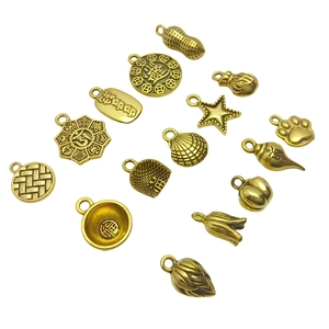 Ethnic vintage gold peanut and coin pendants for DIY jewelry and bracelet crafts