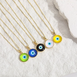 Detailed set of five round evil eye pendant necklaces in vibrant colors and gold finish