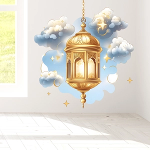 Close-up of golden Ramadan star and moon hanging lantern stickers on a bright wall