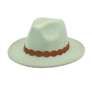 Detail of light mint green wool felt fedora featuring a brown braided leather band