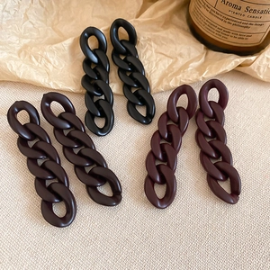 Exaggerated long acrylic chain earrings in black and deep burgundy matte finish