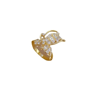 Adjustable gold butterfly ring with sparkling cubic zirconia stones on white background