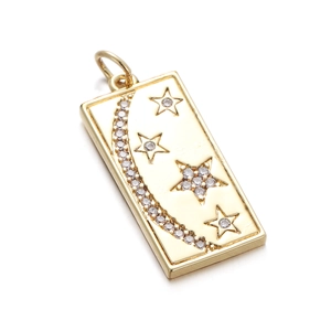 Close-up of a gold rectangle pendant with crescent moon, star, and sparkling zircons