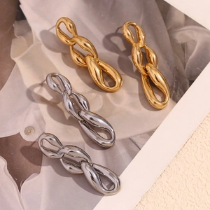Three-link chain drop earrings in gold and silver finish with industrial style