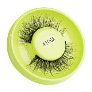Detail of glue-free false eyelashes style #106A in a light green round storage case