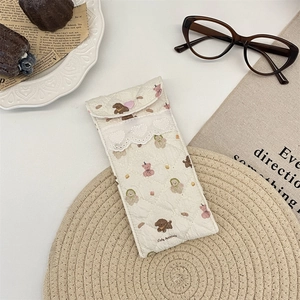 Quilted fabric glasses pouch with cute animal prints and white lace trim detail