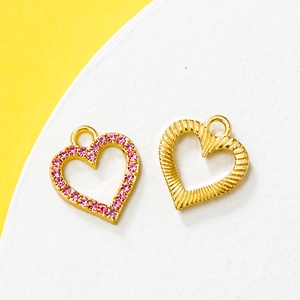 Golden heart charms with pink zircon and radiant texture for DIY jewelry making
