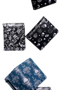 Flat lay of multiple gothic short wallets featuring skull, black cat, and bat prints
