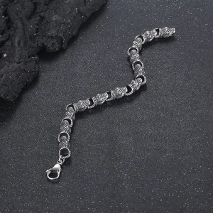 Vintage stainless steel snake head bracelet for men featuring detailed punk casting design