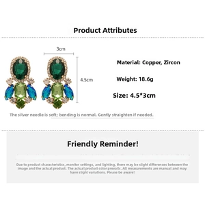 Vintage oval green gemstone earrings with copper and zircon details measuring 4.5 by 3cm