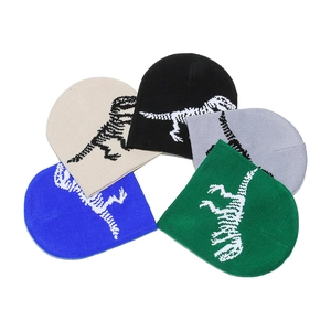 Kids knitted dinosaur skeleton beanie hats in five colors including blue and green