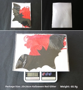 Detail view of red glitter Halloween bat banner with 20x26cm packaging and 68.9g weight