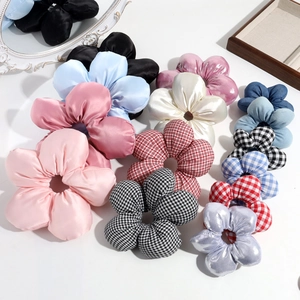 Oversized satin flower hair scrunchies in multiple colors for an elegant french style look