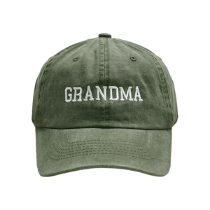Close-up of white GRANDMA embroidery on vintage washed green cotton baseball cap