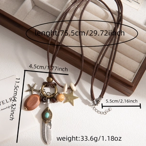 Detailed view of bohemian feather necklace dimensions and weight on wood display