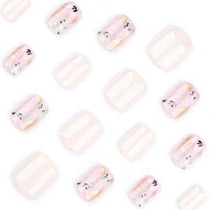 Short square press-on nails in cream pink with abstract flowers, gold foil, and stripes