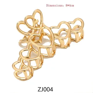 Golden heart-shaped metal shark hair clip hair accessory for women size 8x4cm