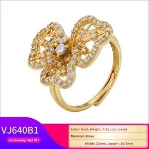 Détails de la bague fleur dorée avec dimensions 22x26,5mm et poids de 4,4 grammes