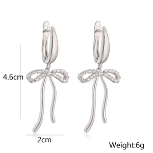 Bow drop earrings in silver finish with zircons, size details 4.6cm by 2cm and 6g weight