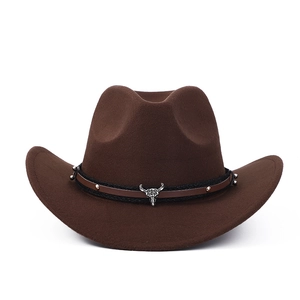 Dark brown wool western cowboy hat featuring a silver bull skull metal buckle accessory