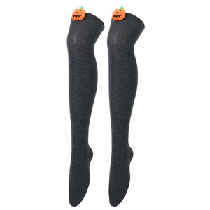 Detail of dark grey over-knee socks with orange plush pumpkin charms for Halloween