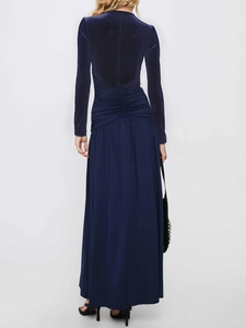 Rear view of deep blue velvet maxi dress featuring elegant waist ruching and long sleeves