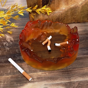 Amber mountain-shaped resin ashtray mold with irregular rocky edges for DIY home decor