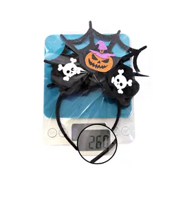 Halloween headband weighing 26.0g featuring pumpkin, spider web and skulls