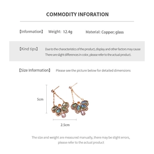 Detailed dimensions and specs for glass butterfly drop earrings made of copper and glass