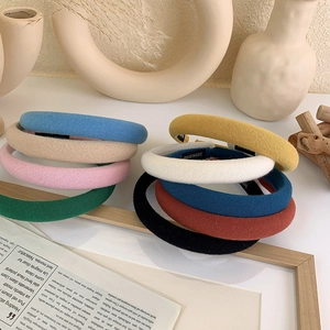 Thick padded sponge headband in various solid colors for an elegant elevated hair look