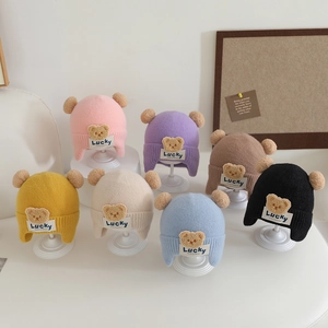 Toddler knitted earflap hat with plush pom-poms and teddy bear patch in 7 assorted colors