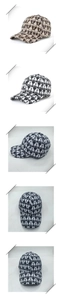 Detailed view of baseball cap featuring repeating cat silhouette patterns in brown and black