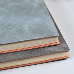 Premium A5 business notebook set with gray matte leather covers and thick cream paper
