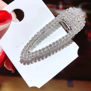 Sparkling silver alloy teardrop hair clip with full rhinestone pavé on a white display card