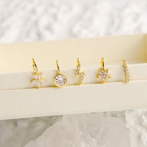 Set of five gold-plated nose cuffs with micro-pave zircon heart and lightning bolt shapes