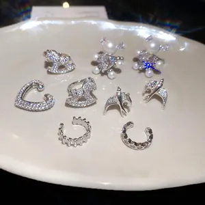 Elegant silver zircon and pearl ear cuff collection with heart and animal shapes
