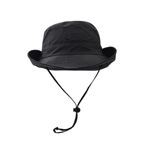 Waterproof outdoor bucket hat for women with adjustable chin strap in black quick-dry fabric