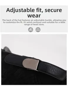 Detail of adjustable faux leather back strap with silver metal buckle on a black baseball cap