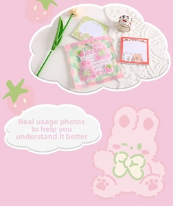 Detailed view of cute cartoon stationery set including rabbit notes and decorative washi tape