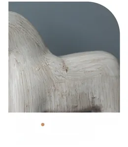 Macro detail of the fluid hand-painted texture on a modern cream horse sculpture