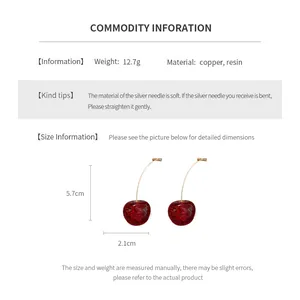 Size chart showing dimensions and weight of red resin cherry earrings with copper hardware