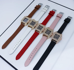 Close-up of square quartz watches with diamond bezels and colorful leather straps