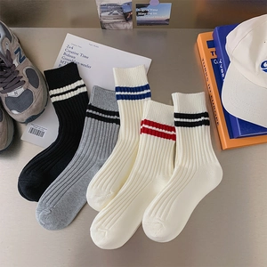 Five pairs of thick combed cotton ribbed socks with double stripes in casual setting