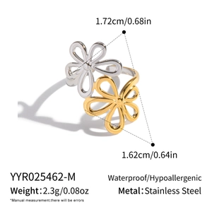 Detail shot showing size dimensions of two-tone floral open ring in stainless steel