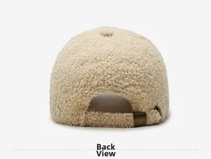 Rear view of cream fleece baseball cap showing the adjustable bronze metal buckle strap