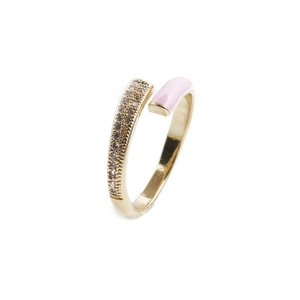 Macro view of adjustable gold ring with pink enamel inlay and micro-paved rhinestones
