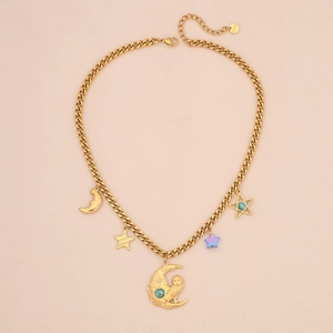 Detailed view of a gold stainless steel necklace featuring star, moon, and owl charms