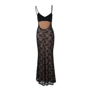 Detail of black floral lace fabric with nude lining on backless mermaid evening gown