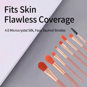8-piece travel makeup brush set with orange microcrystalline fiber and pink handles