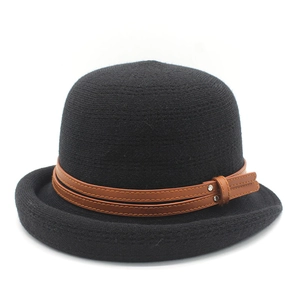 British style black wool bowler hat with rolled brim and brown leather studded band